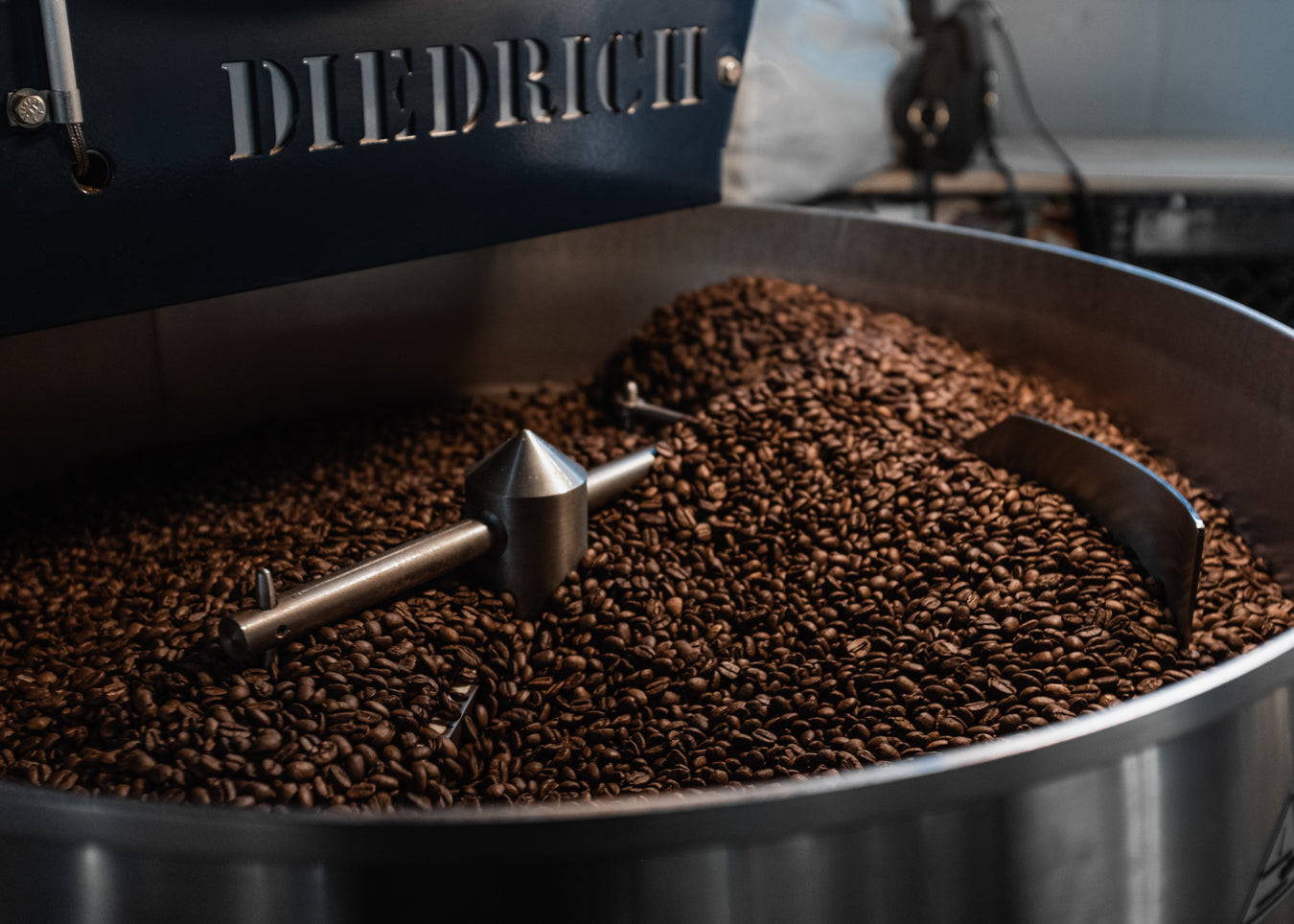 Freshly roasted coffee beans cooling in the Diedrich roaster at The Roasted Record