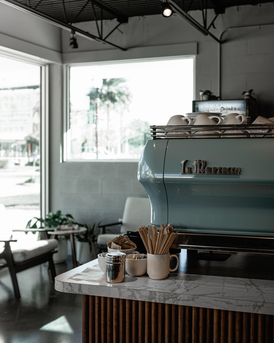 La Marzocco espresso machine inside The Roasted Record cafe in Stuart, Florida